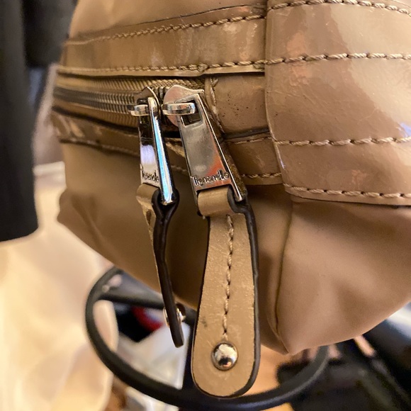 Tignanello, duo compartment, bucket style, zipper area below, a good baby bag. - Picture 10 of 14